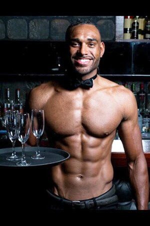 black topless waiter serving a tray of drinks